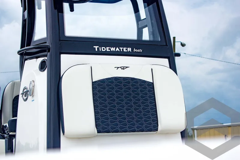Slide: The Image of 2025 Tidewater 2410 Bay Max boat, featuring sleek design and modern upholstery. - 16