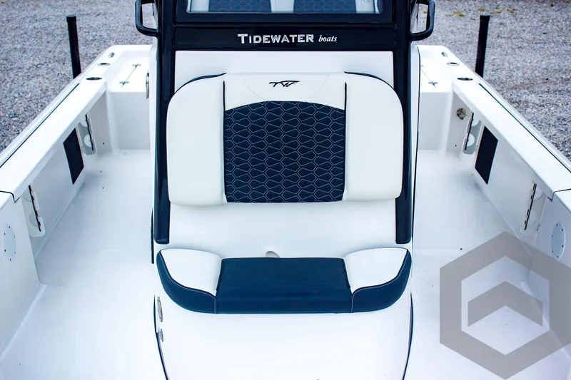 Slide: The Image of 2025 Tidewater 2410 Bay Max boat interior with stylish seating and modern design. - 24
