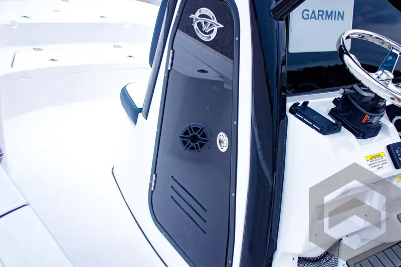 Slide: The Image of 2025 Tidewater 2410 Bay Max boat console with Garmin navigation system. - 28