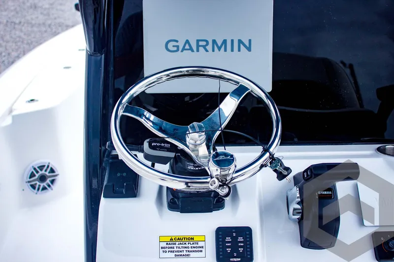 Slide: The Image of Steering wheel of 2025 Tidewater 2410 Bay Max boat with Garmin navigation system. - 34