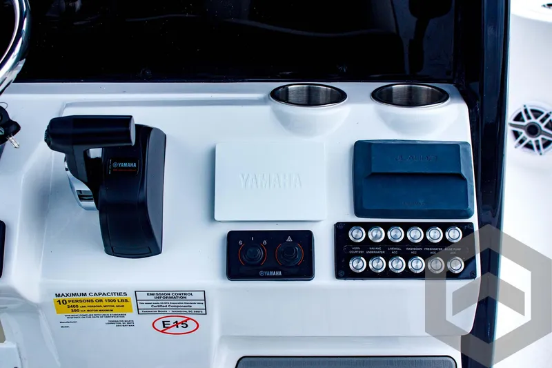 Slide: The Image of Control panel of 2025 Tidewater 2410 Bay Max boat with Yamaha components and switches. - 35