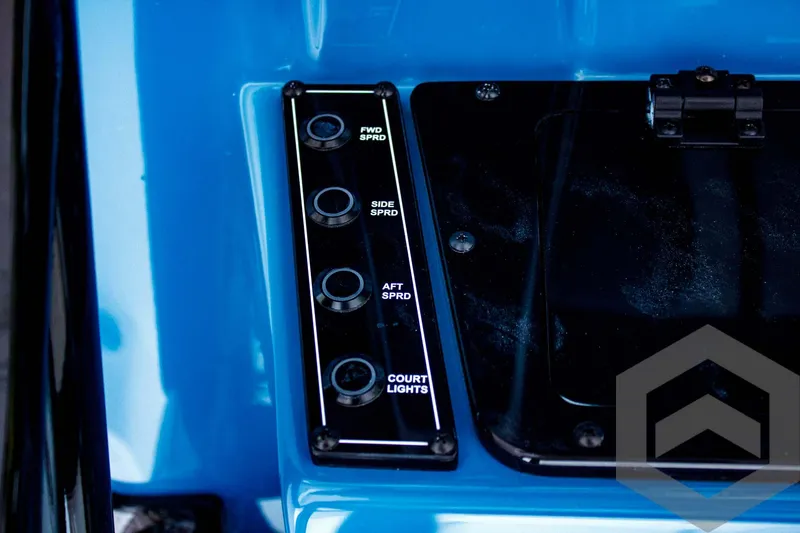 Slide: The Image of Control panel of 2025 Tidewater 2410 Bay Max boat with labeled switches. - 44