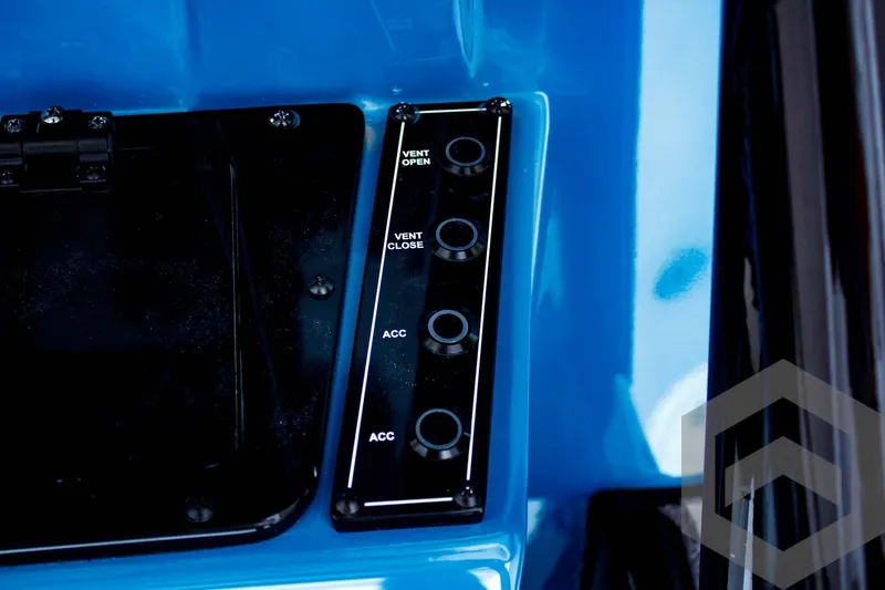 Slide: The Image of Control panel of 2025 Tidewater 2410 Bay Max boat with vent and accessory switches. - 45