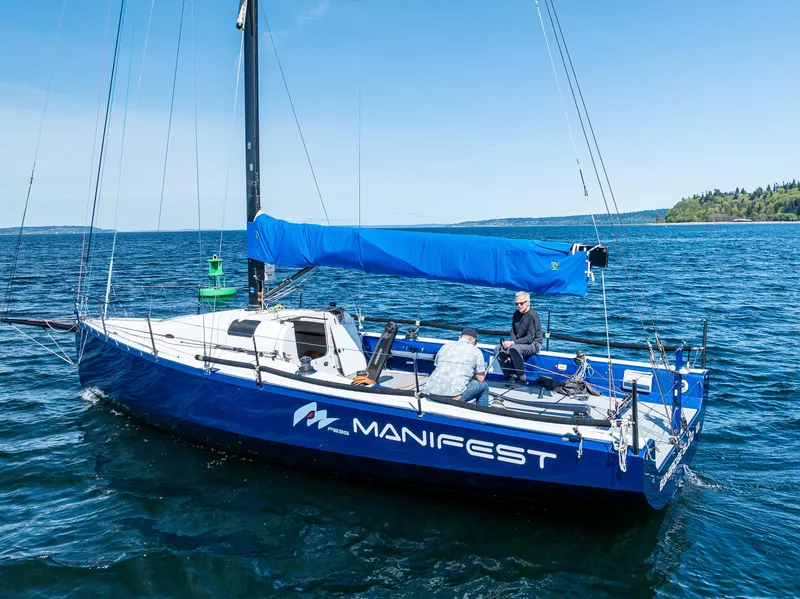 Slide: The Image of 2016 Offshore Racing Van Munster Boats Fred Barrett 35 sailboat on open water. - 2
