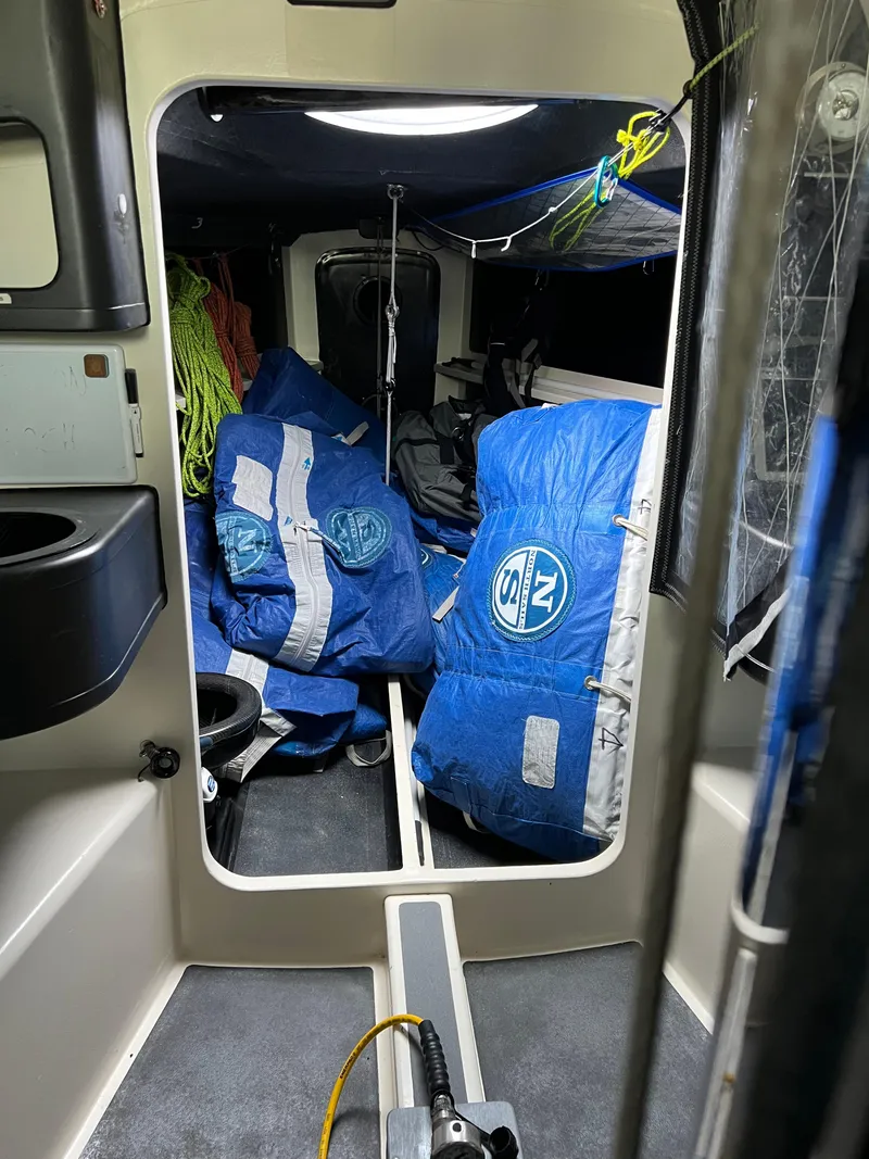 Slide: The Image of Interior of 2016 Offshore Racing Van Munster Boats Fred Barrett 35 with blue sails stored. - 49
