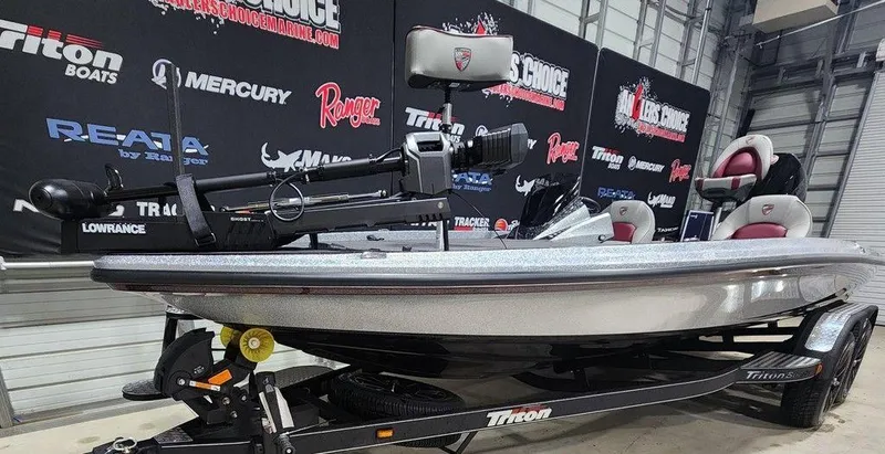 Slide: The Image of 2025 Triton 20XP Patriot boat in showroom, featuring sleek design and advanced equipment. - 4