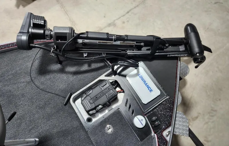 Slide: The Image of Triton 20XP Patriot 2025 boat deck with Lowrance equipment and control panel. - 8