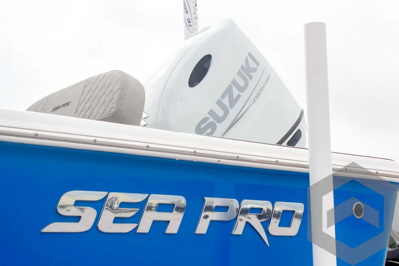 Slide: The Image of 2023 Sea Pro 208 Bay boat with Suzuki engine, blue exterior. - 15