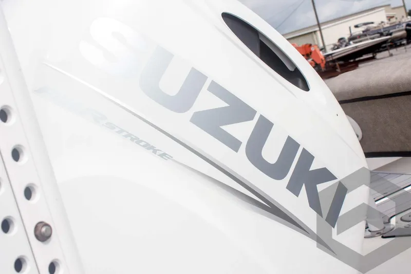 Slide: The Image of 2023 Sea Pro 208 Bay boat with Suzuki outboard motor, close-up view. - 17