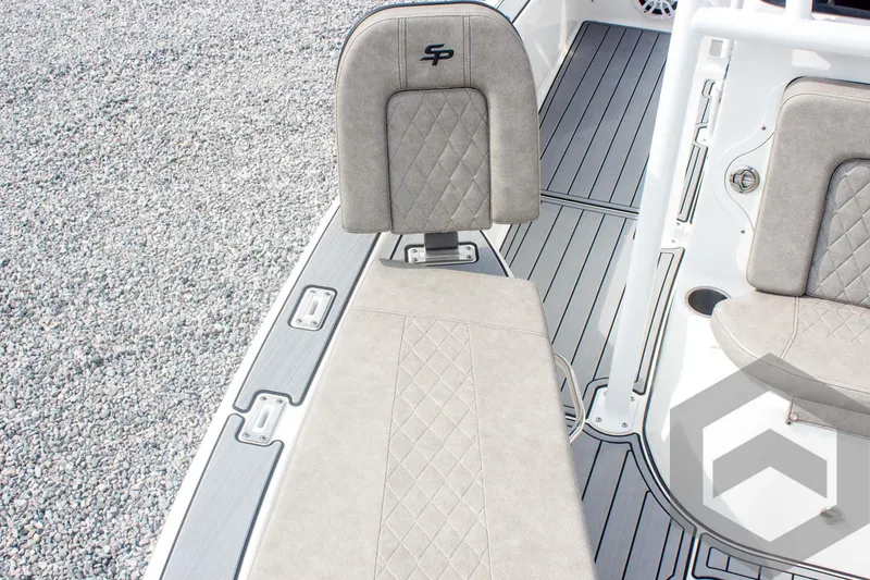 Slide: The Image of 2023 Sea Pro 208 Bay boat interior with cushioned seating and textured flooring. - 26