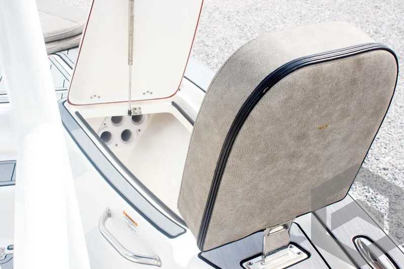 Slide: The Image of 2023 Sea Pro 208 Bay boat seat with storage compartment open. - 29