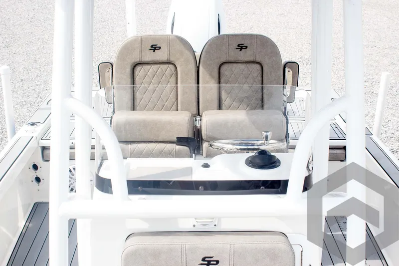 Slide: The Image of 2023 Sea Pro 208 Bay boat interior with dual seats and console. - 33