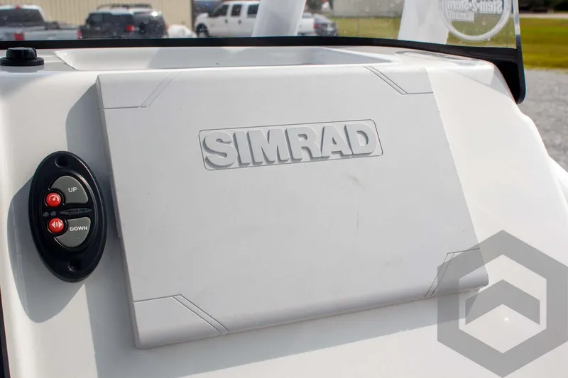 Slide: The Image of 2023 Sea Pro 208 Bay boat dashboard featuring Simrad navigation system. - 43