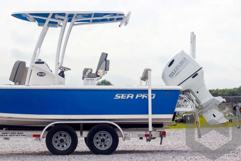 Slide: The Image of 2023 Sea Pro 208 Bay boat with Suzuki outboard engine on trailer. - 5
