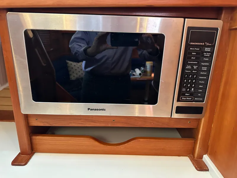 Slide: The Image of Panasonic microwave in 2005 Sabre 38 Hardtop Express yacht kitchen. - 29