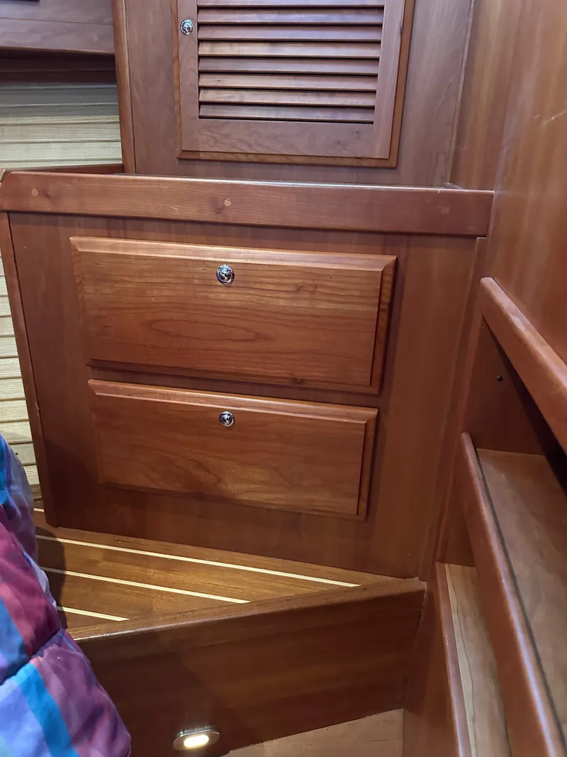 Slide: The Image of Wooden cabinetry inside a 2005 Sabre 38 Hardtop Express boat. - 36