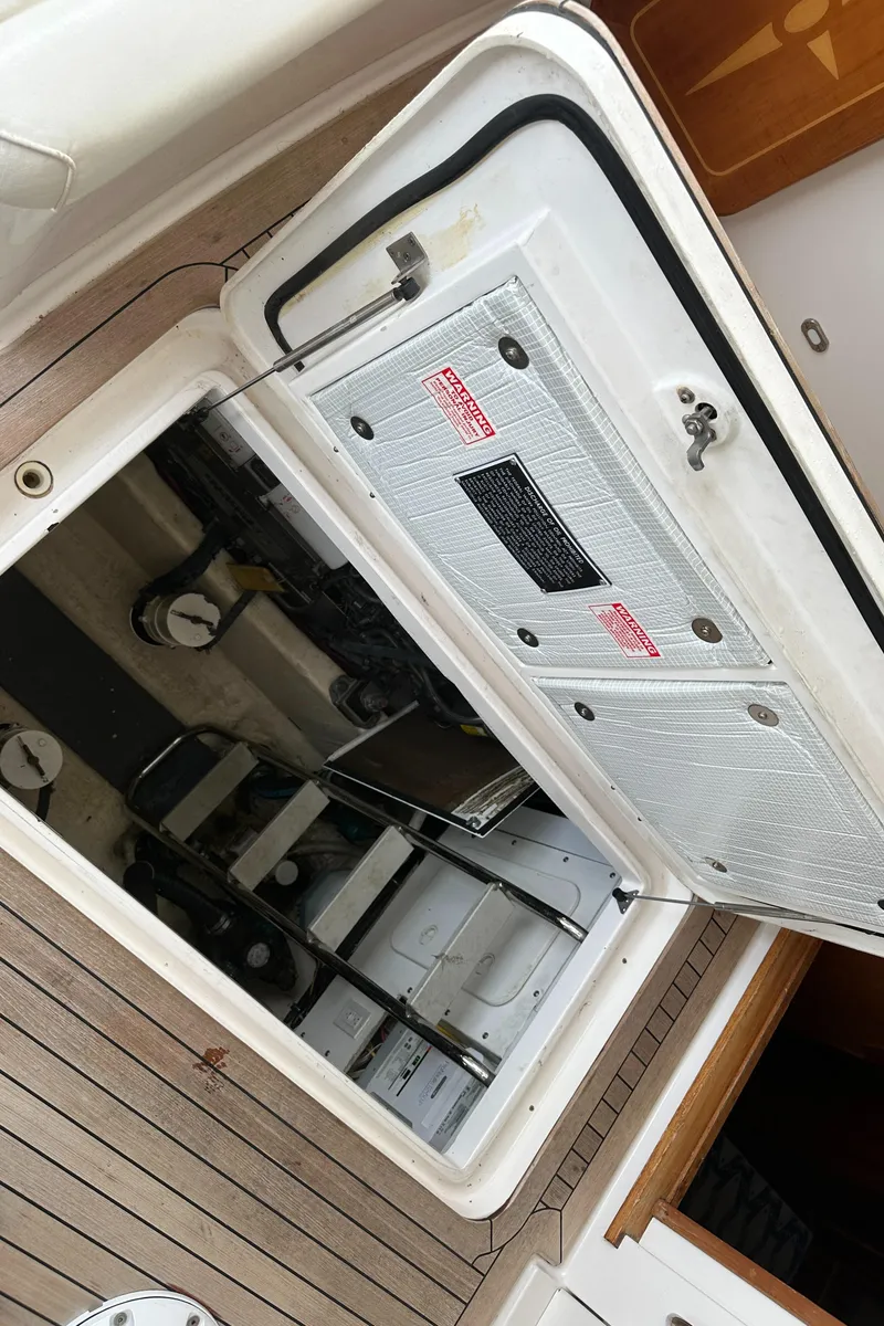 Slide: The Image of Engine compartment of 2005 Sabre 38 Hardtop Express with open hatch. - 40