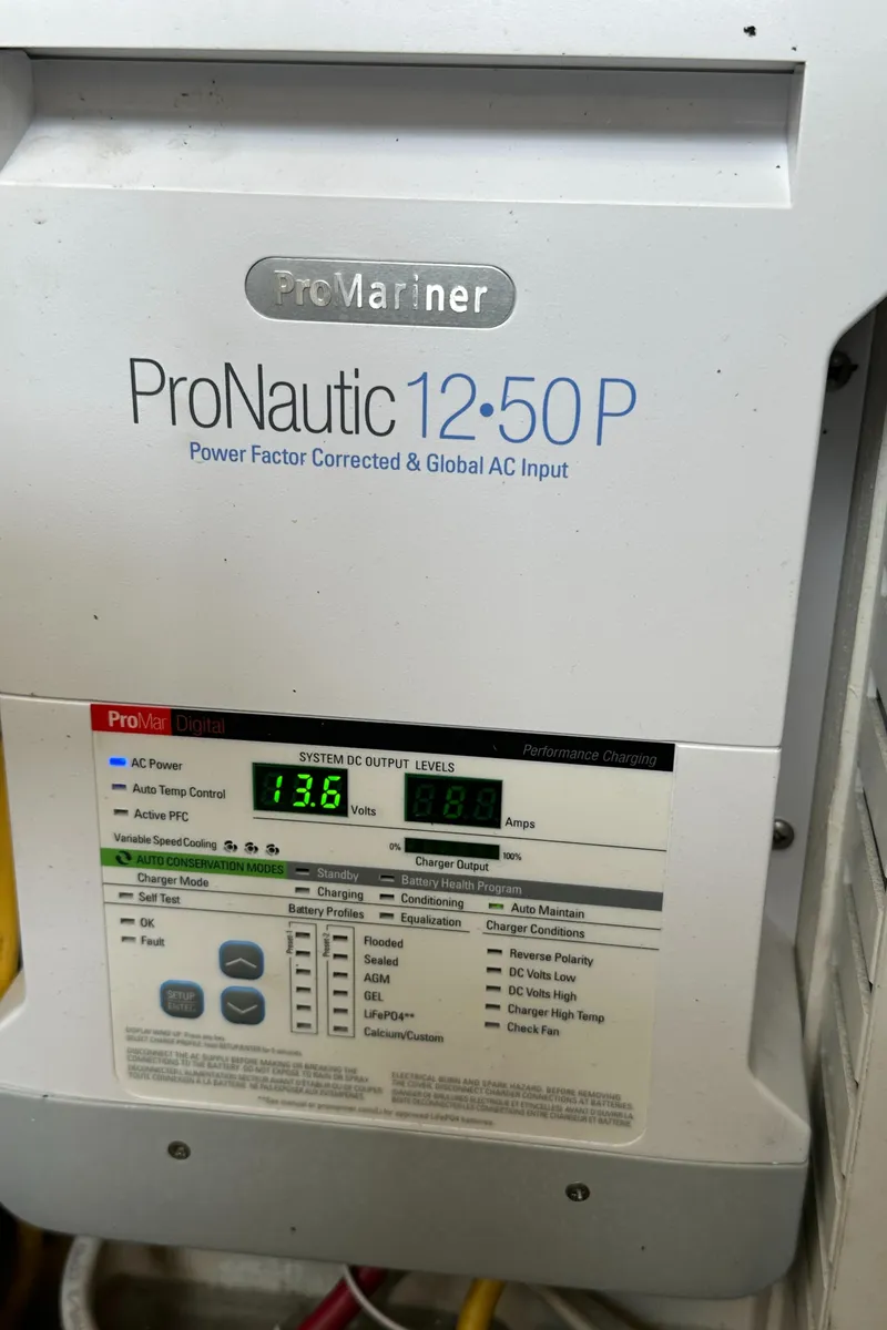 Slide: The Image of ProNautic 12:50P marine battery charger on 2005 Sabre 38 Hardtop Express. - 48