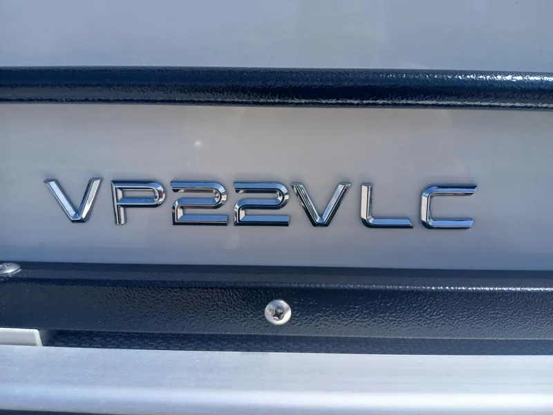 Slide: The Image of 2023 Veranda VP22VLC model emblem on a sleek metallic surface. - 13
