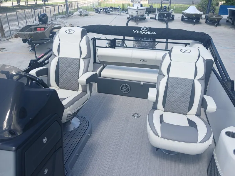 Slide: The Image of 2023 Veranda VP22VLC boat interior with plush seating and modern design. - 18