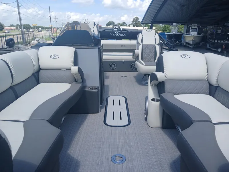 Slide: The Image of 2023 Veranda VP22VLC pontoon boat interior with luxurious seating and modern design. - 4