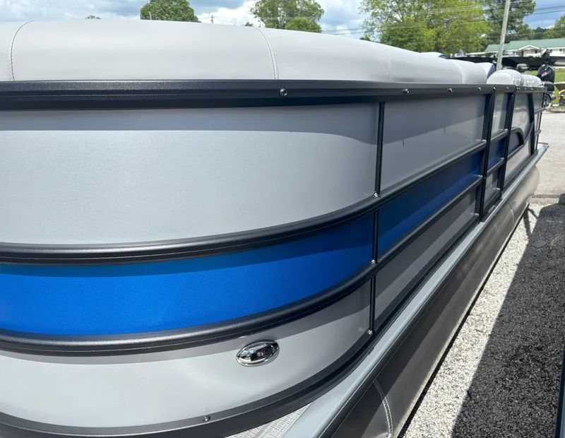 Slide: The Image of 2025 Bentley Pontoons Legacy 223 Cruise XL with sleek blue and gray design. - 10