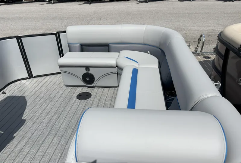 Slide: The Image of 2025 Bentley Pontoons Legacy 223 Cruise XL interior with gray seating and blue accents. - 4