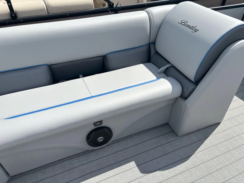 Slide: The Image of 2025 Bentley Pontoons Legacy 223 Cruise XL interior seating with elegant gray upholstery. - 7