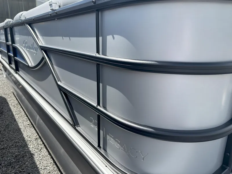 Slide: The Image of 2025 Bentley Pontoons Legacy 223 Cruise XL, sleek design, side view, metallic finish. - 9