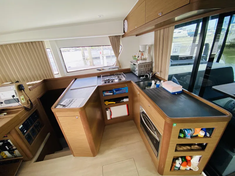 Slide: The Image of Interior of 2019 Lagoon 42 Owners Version yacht kitchen with modern amenities. - 20