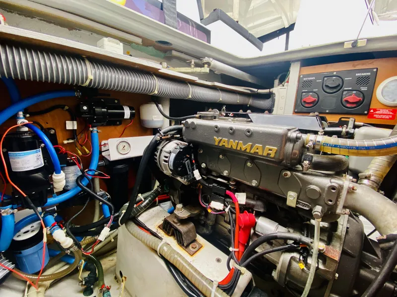 Slide: The Image of Engine compartment of a 2019 Lagoon 42 Owners Version catamaran with Yanmar engine. - 44
