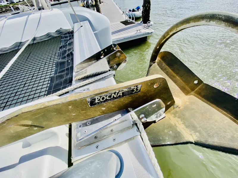 Slide: The Image of 2019 Lagoon 42 Owners Version catamaran with Rocna 33 anchor at dock. - 13