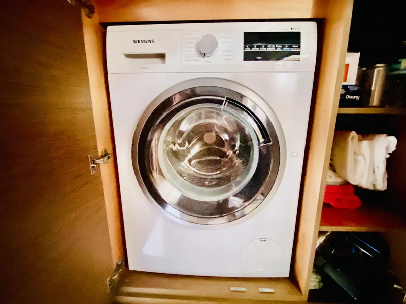 Slide: The Image of Washing machine in a 2019 Lagoon 42 Owners Version yacht interior. - 26