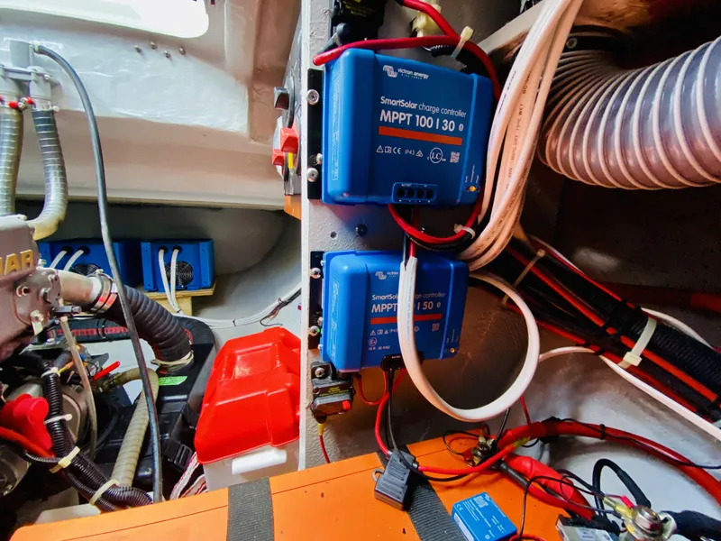 Slide: The Image of Electrical system inside a 2019 Lagoon 42 Owners Version yacht, featuring MPPT charge controllers. - 47
