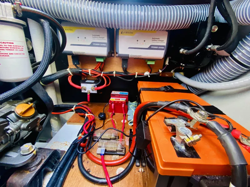 Slide: The Image of Electrical system of a 2019 Lagoon 42 Owners Version yacht, featuring wiring and components. - 49