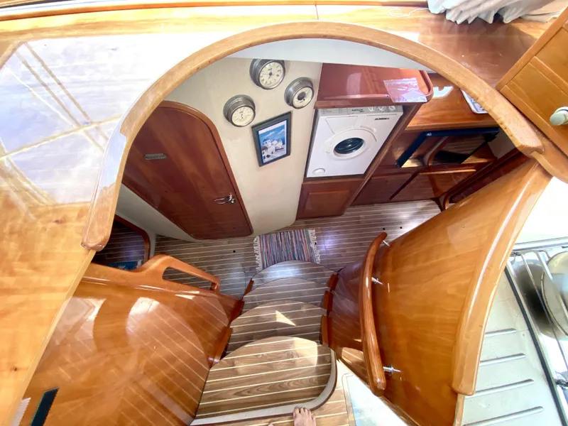 Slide: The Image of Interior of 2006 Privilege 435 yacht with wooden finish and built-in appliances. - 26