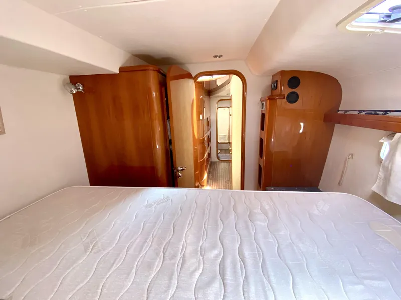 Slide: The Image of Luxurious cabin interior of 2006 Privilege 435 yacht with wooden finishes. - 41