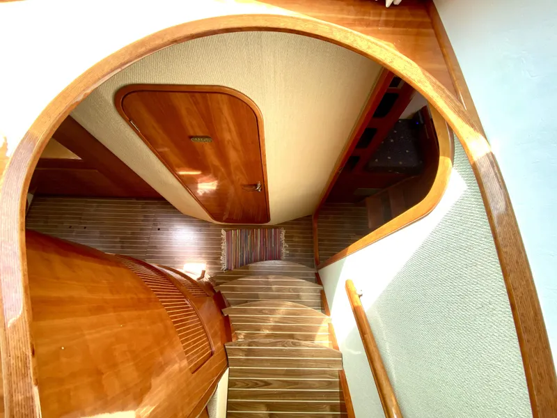 Slide: The Image of Interior of 2006 Privilege 435 yacht with wooden stairs and door. - 42