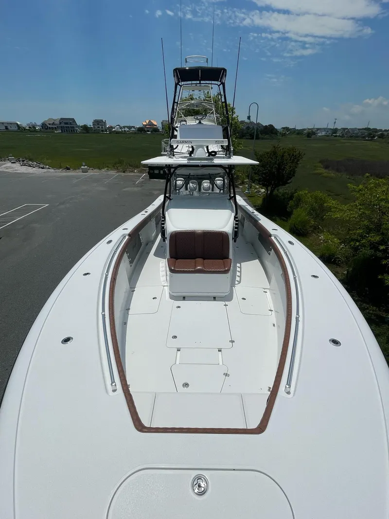 Slide: The Image of 2008 Yellowfin 42 boat with spacious deck and dual helm stations. - 12