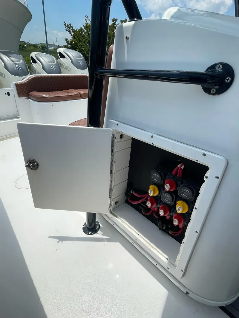 Slide: The Image of 2008 Yellowfin 42 boat battery compartment with open access panel. - 22