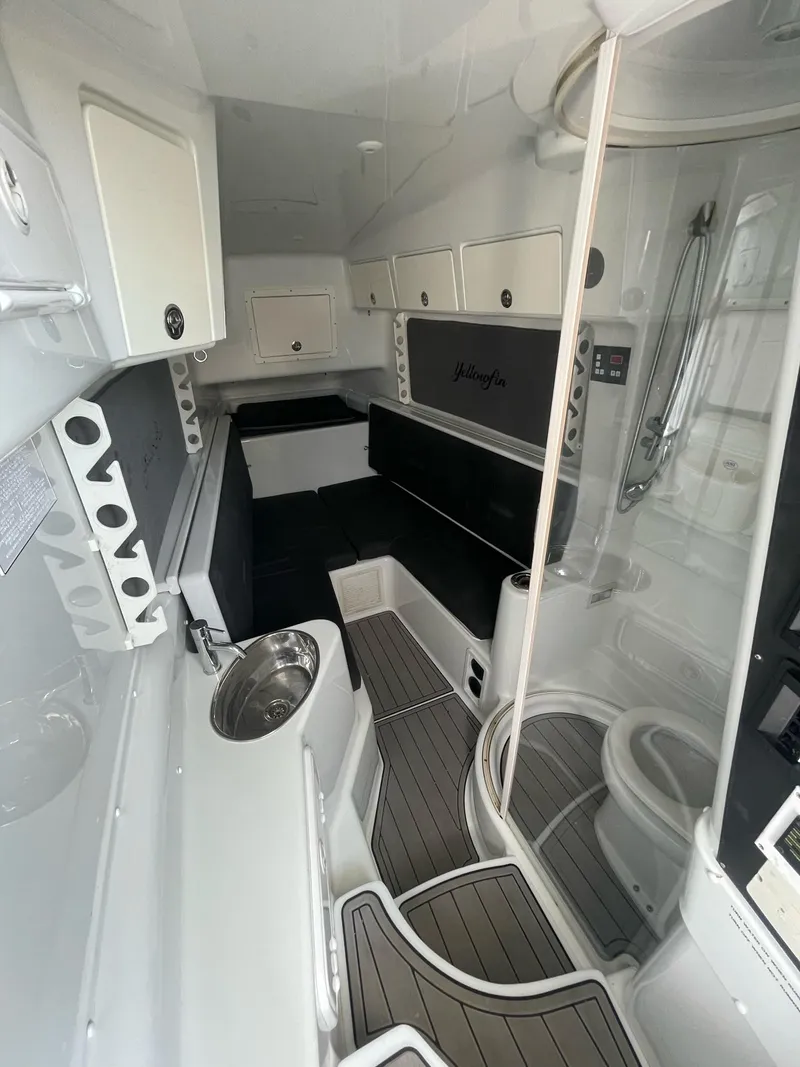Slide: The Image of 2008 Yellowfin 42 interior with modern amenities, sleek design, and efficient layout. - 24