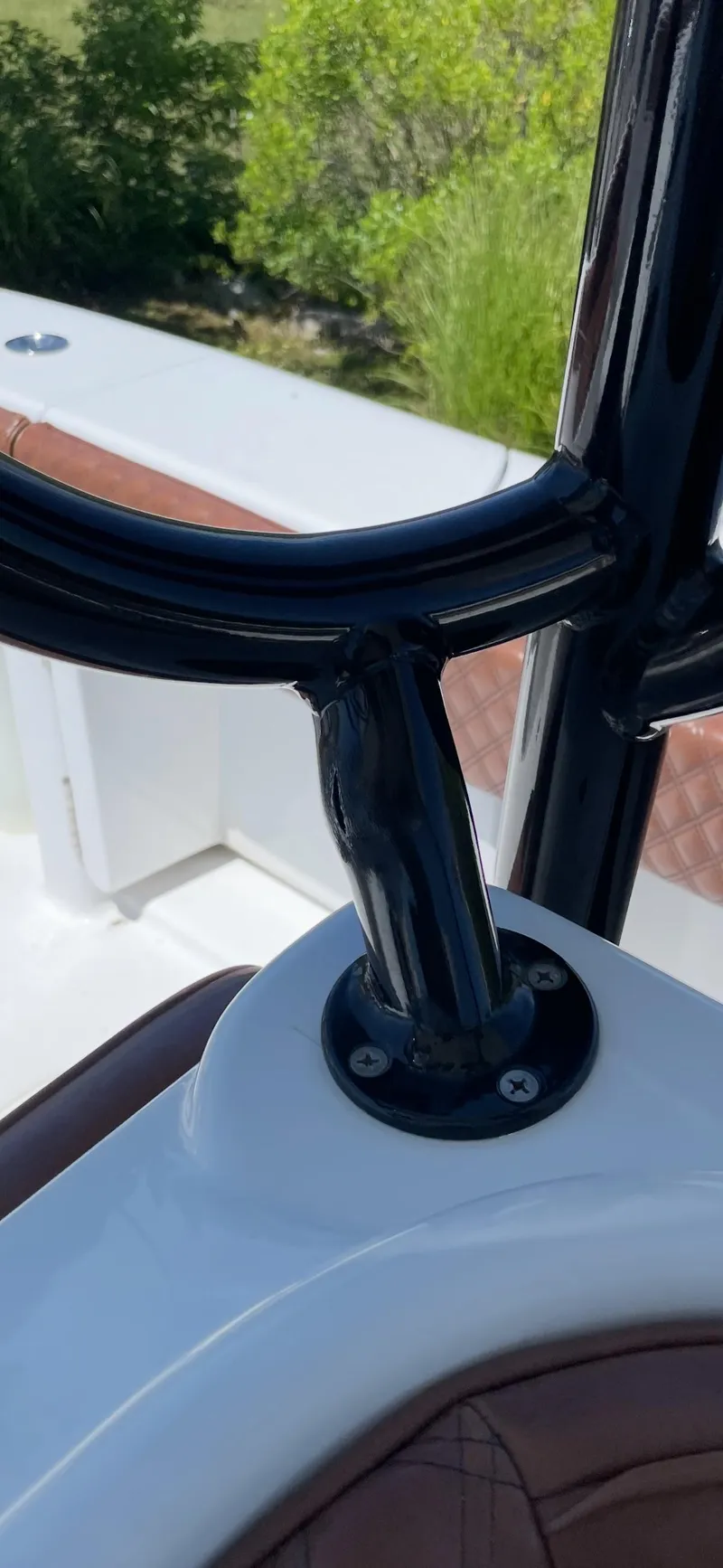 Slide: The Image of Close-up of a 2008 Yellowfin 42 boat's steering wheel and console. - 35