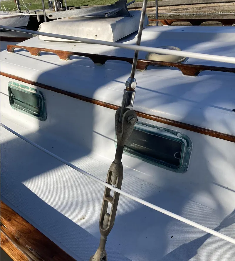 Slide: The Image of Close-up of rigging on a 1983 Durbeck 38 sailboat deck. - 10