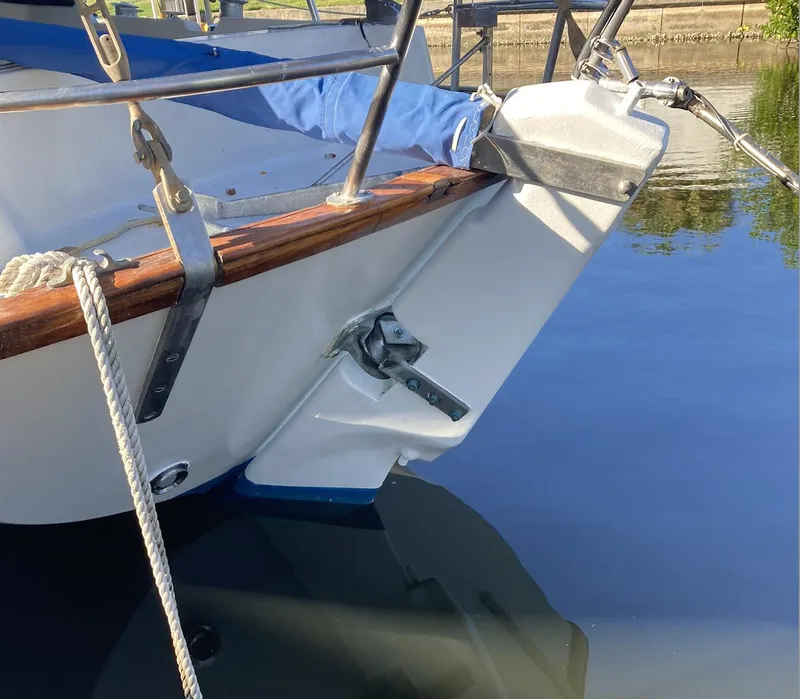 Slide: The Image of 1983 Durbeck 38 engine, detailed view of mechanical components and hoses. - 13