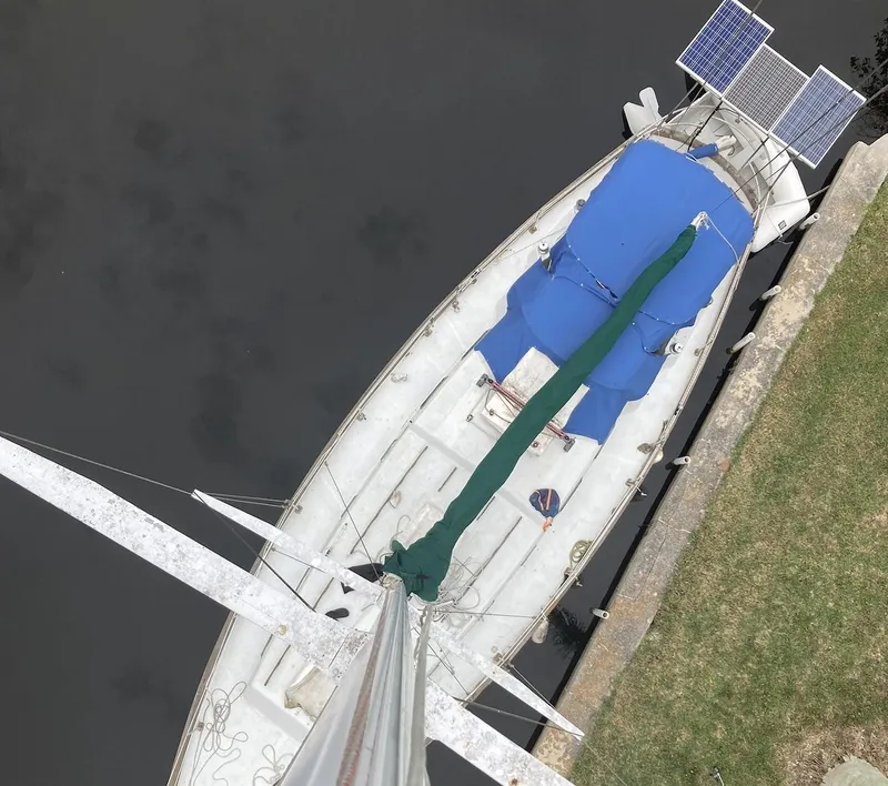Slide: The Image of 1983 Durbeck 38 sailboat on open sea under clear blue sky. - 3