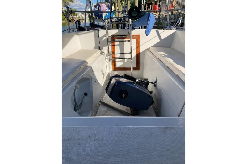 Slide: The Image of 1983 Durbeck 38 sailboat cockpit with seating and steering wheel. - 33