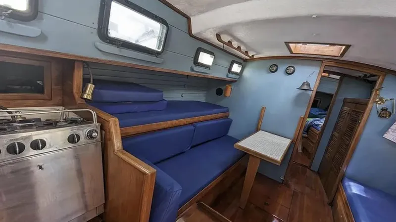 Slide: The Image of Wooden control panel on a 1983 Durbeck 38 boat with gauges and switches. - 7