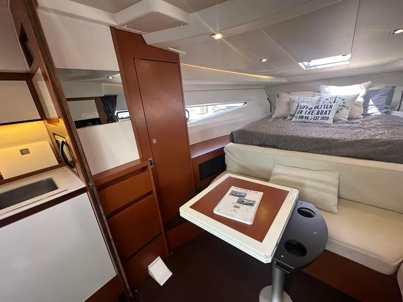 Slide: The Image of Interior of 2016 Jeanneau Leader 36 yacht with cozy seating and modern amenities. - 23