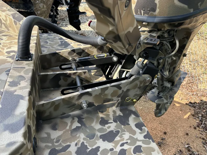 Slide: The Image of Camouflage-patterned Excel Viper F4 1751 boat motor, 2025 model, with detailed mechanical components. - 10