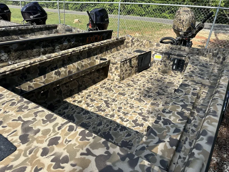 Slide: The Image of Camouflage-patterned 2025 Excel Viper F4 1751 boat with Tohatsu outboard motors. - 8